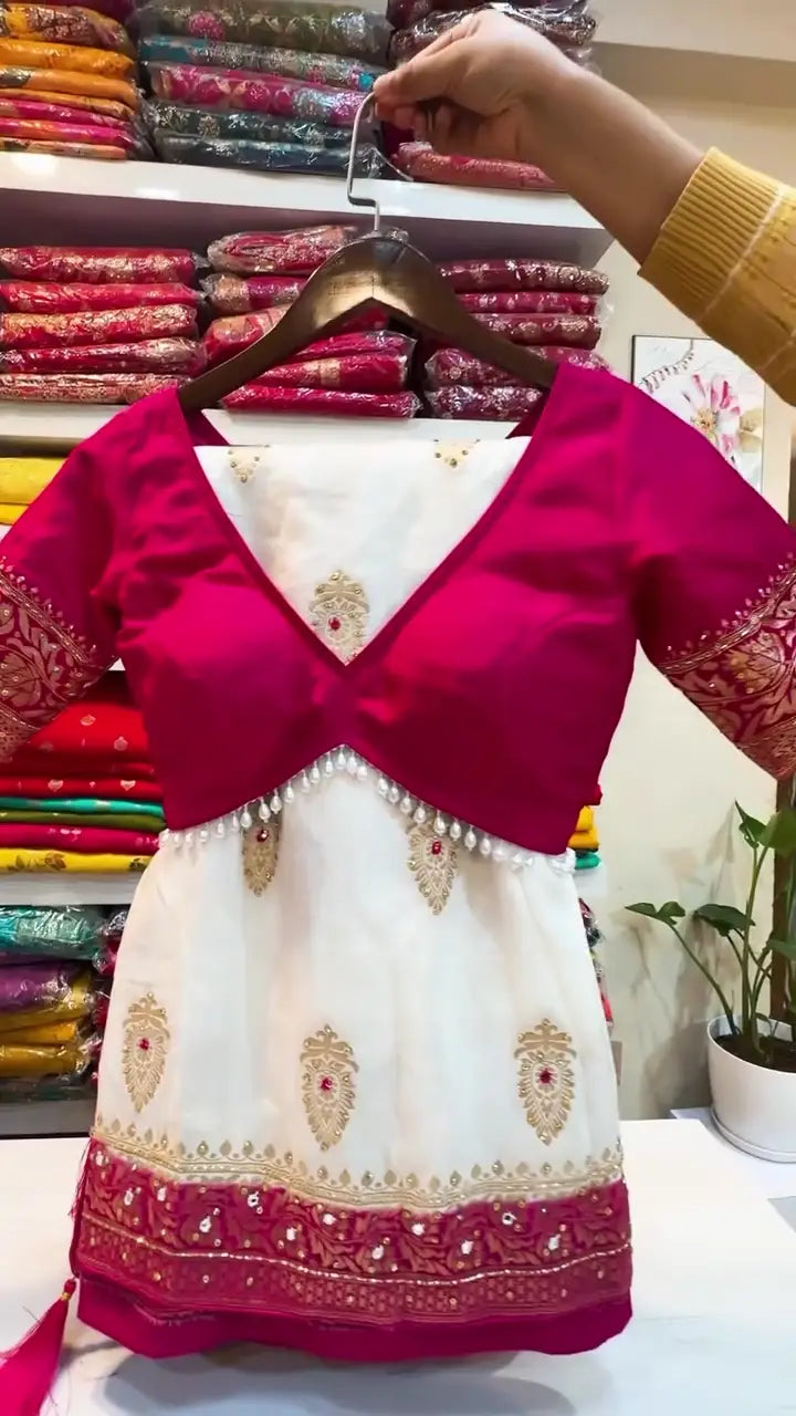 Off-White and Rani Pink Embroidered Lehenga Choli Set